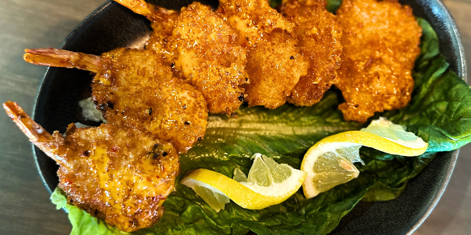 breaded fried firecracker shrimp served with lemon twist lettuce